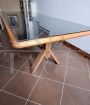 Large vintage walnut table with black glass top