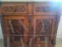 Antique sculpted sideboard with 2 doors and white marble top, early 19th century