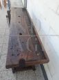 Antique carpenter's bench table from the early 19th century in oak with vice