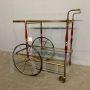 Cesare Lacca serving trolley in brass, glass and burgundy lacquered wood