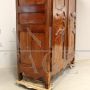 Antique Louis XV wardrobe or cupboard in walnut and cherry with carvings, 18th century