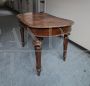 Antique extendable table with oval top