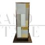 Decorative columns in brass and glass    