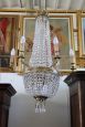 Antique chandelier from the late 19th century in gilded bronze with crystal drops