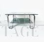 Mid-century steel coffee table with double smoked glass top