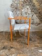 Pair of orange postmodern armchairs with white bouclé wool fabric