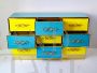 Design chest of drawers with 9 drawers in yellow and blue glass