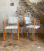 Pair of orange postmodern armchairs with white bouclé wool fabric