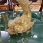 Pair of Salviati candlesticks with dolphins in golden Murano glass