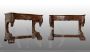 Pair of antique Louis Philippe Neapolitan consoles in mahogany feather