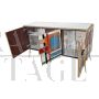 Three-door sideboard in multicolored glass with mirrored interior