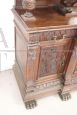 Imposing antique cupboard in carved solid walnut with mirror, 19th century