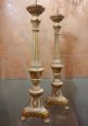 Pair of lacquered and gilded wooden candlesticks