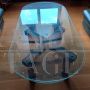 Design wooden coffee table with oval glass top