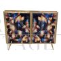 Design sideboard in artistic colored glass with lighting