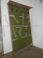 Vintage coat hanger in green leatherette