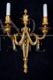 Pair of antique Napoleon III wall lights in finely chiseled gilded bronze