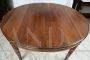 Antique Napoleon III oval extendable table in solid walnut