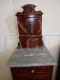 Pair of antique carved bedside tables with marble top and glass door, 1920s