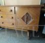 Pair of 1950s sideboards with carvings