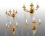 Set of 4 antique French Empire wall lights in gilded and patinated bronze