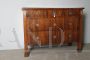 Antique Italian Empire chest of drawers from the early 19th century in walnut