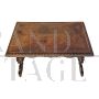 Antique carved desk table with studded leather top