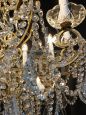 Florentine style chandelier in gilded iron and crystal