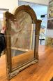 Small antique Louis Philippe mirror carved and gilded, 19th century