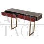 Console in brass and red glass with marbled effect