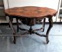 Antique carved biscuit table in walnut from the early 19th century           