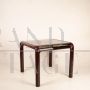 Orsay 54A table by Gae Aulenti for Knoll with glass top, burgundy color