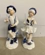 He and She, a pair of signed Capodimonte porcelain sculptures