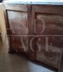 Antique sculpted sideboard with 2 doors and white marble top, early 19th century