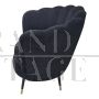 Design armchair with fan-shaped backrest