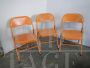 Set of 3 orange metal folding chairs, 1970s