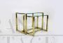 Pair of nesting tables in brass and glass, 1970s