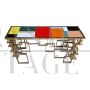 Double-sided console in golden steel with multicolored Murano glass top