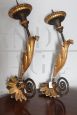 Pair of 18th century wall candle holders in painted and gilded wood       