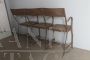 Vintage industrial metal bench with folding seats