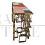 Double-sided console in golden steel with multicolored Murano glass top