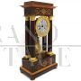 Antique Charles X pendulum clock in inlaid rosewood, 1800