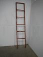 Industrial red metal ladder from the 70s