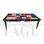 Design table in wood and multicolored glass                            