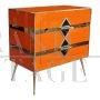 Art deco style bedside cabinet in orange glass with geometries