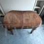 Antique extendable table with oval top