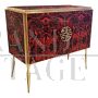 Two-door sideboard in red and black colored glass