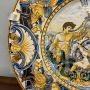 Large antique plate in Neapolitan majolica by Carlo Mollica depicting Neptune