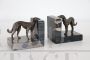 Pair of Art Deco bookends with greyhound dogs in bronze and Portoro marble