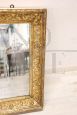 Antique Art Nouveau mirror in gilded wood with gold leaf, early 20th century